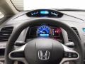 2011 Honda Civic Beige Interior Steering Wheel Photo