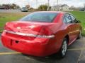 2010 Victory Red Chevrolet Impala LS  photo #2