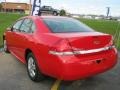 2010 Victory Red Chevrolet Impala LS  photo #11