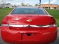 2010 Victory Red Chevrolet Impala LS  photo #12