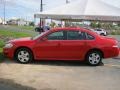 2010 Victory Red Chevrolet Impala LS  photo #13