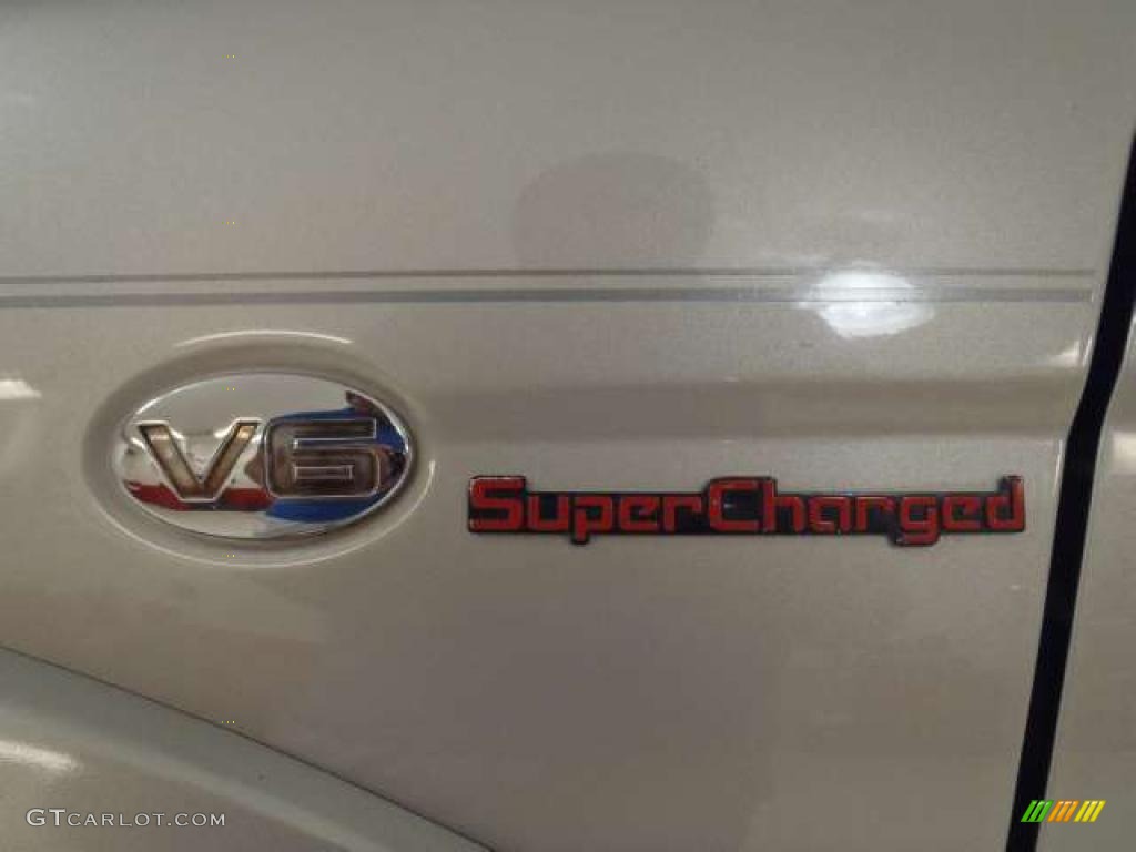 2003 Nissan Frontier SC V6 Crew Cab 4x4 Marks and Logos Photo #38343041
