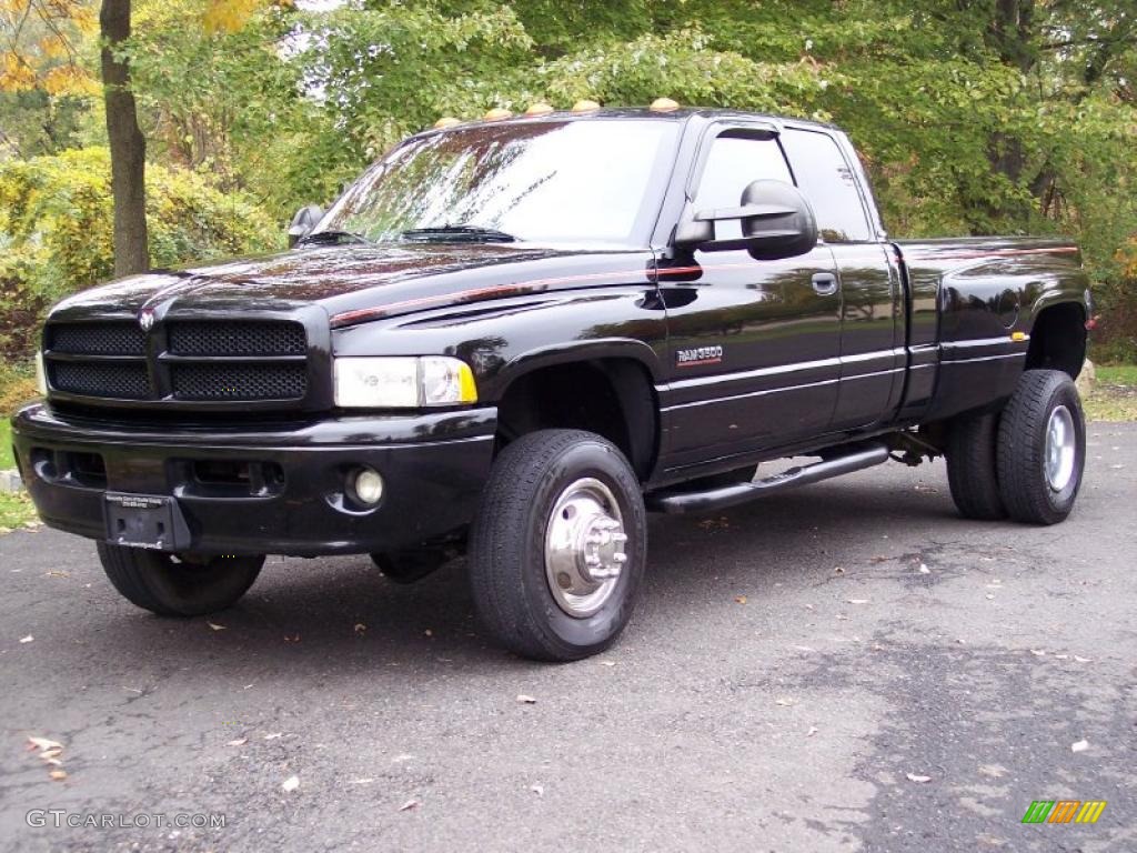 Black 2001 Dodge Ram 3500 SLT Quad Cab 4x4 Dually Exterior Photo #38417233