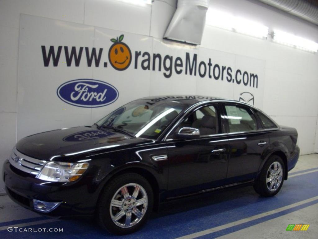 Dark Ink Blue Metallic Ford Taurus