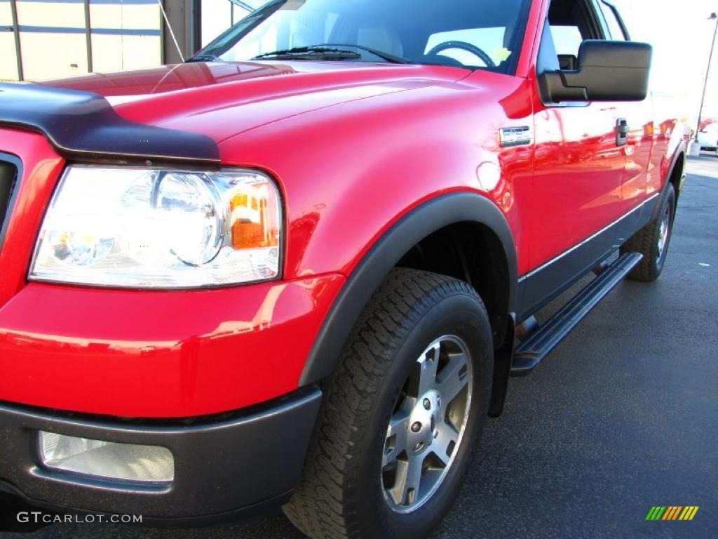 2004 F150 FX4 SuperCab 4x4 - Bright Red / Black/Medium Flint photo #14