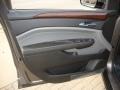 Ebony/Titanium Door Panel Photo for 2011 Cadillac SRX #38471573