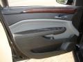 Ebony/Titanium Door Panel Photo for 2011 Cadillac SRX #38472245