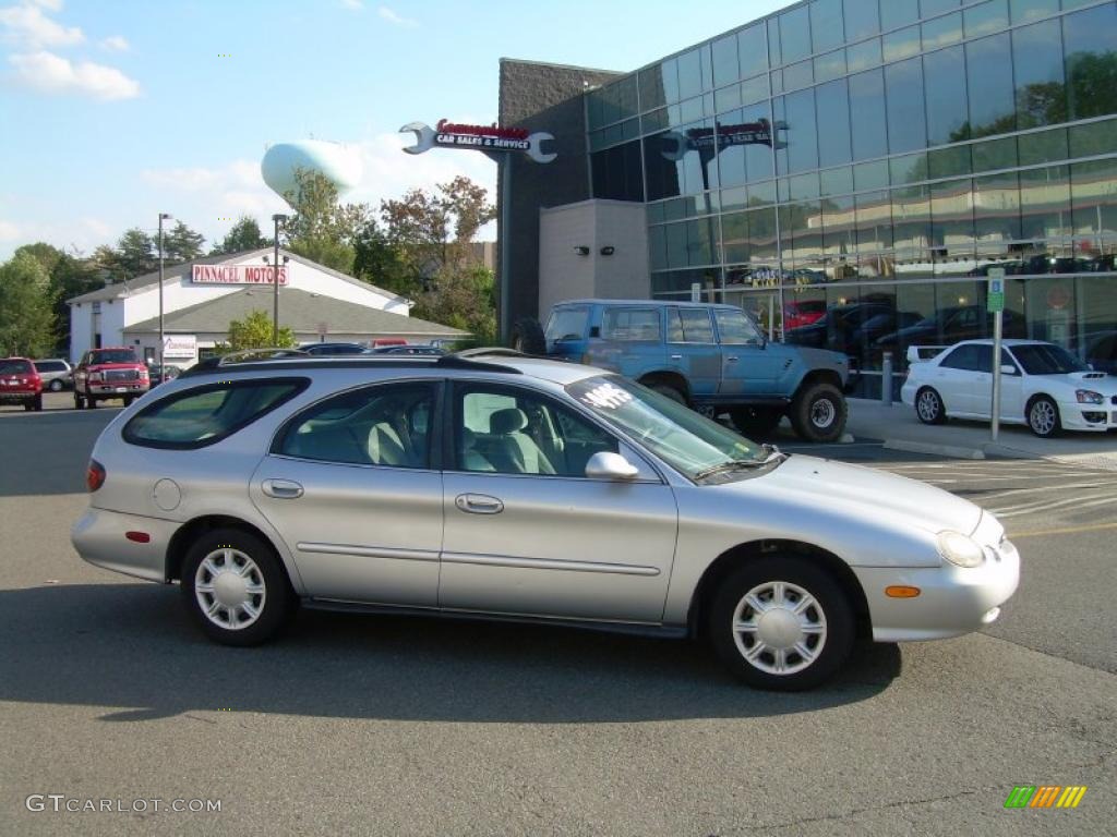 Silver Frost Metallic Ford Taurus