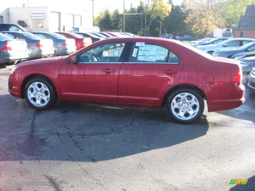 2011 Fusion SE - Red Candy Metallic / Charcoal Black photo #1