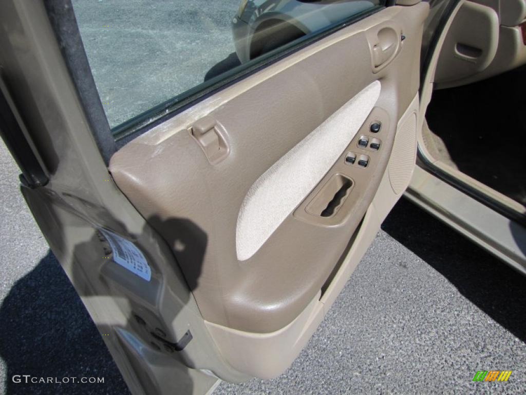 2002 Chrysler Sebring LX Sedan Sandstone Door Panel Photo #38540915