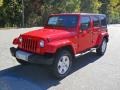 Flame Red 2011 Jeep Wrangler Unlimited Sahara 4x4 Exterior
