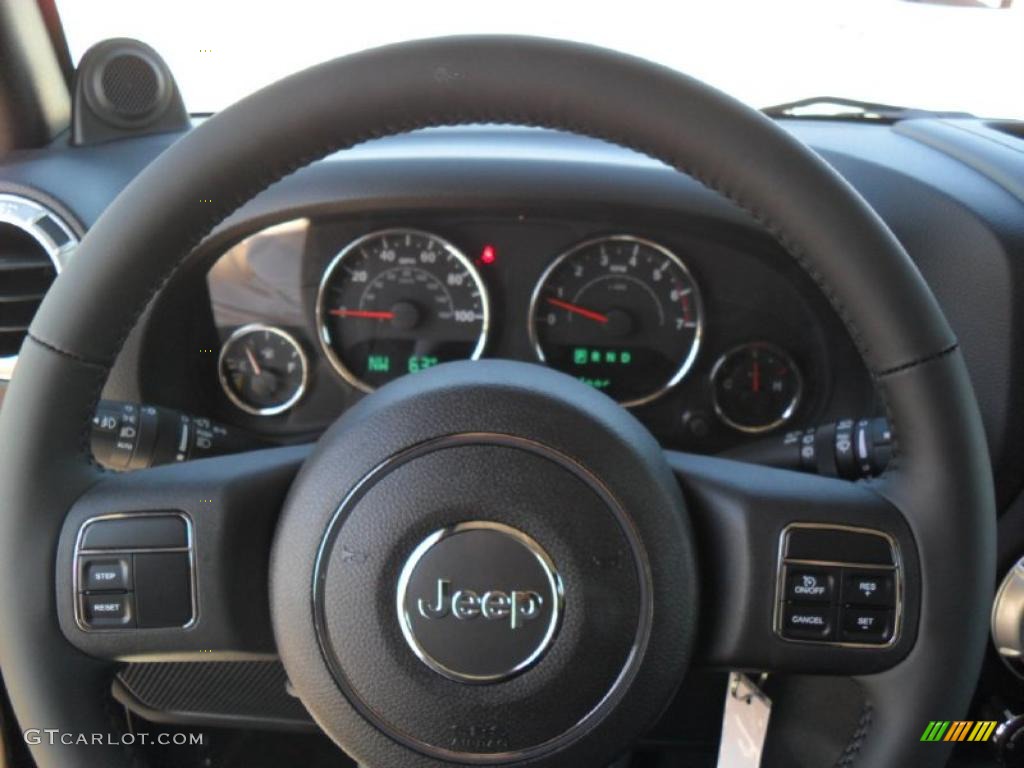 2011 Jeep Wrangler Unlimited Sahara 4x4 Black Steering Wheel Photo #38587601