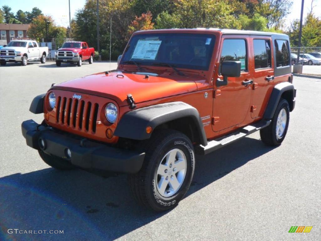 2011 Wrangler Unlimited Sport 4x4 - Mango Tango Pearl / Black photo #1