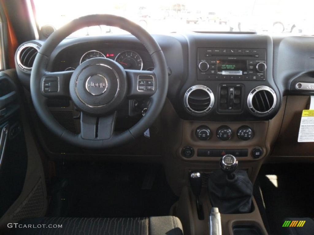 2011 Jeep Wrangler Unlimited Rubicon 4x4 Black/Dark Saddle Dashboard Photo #38589433