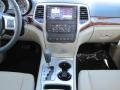 Black/Light Frost Beige Controls Photo for 2011 Jeep Grand Cherokee #38601561
