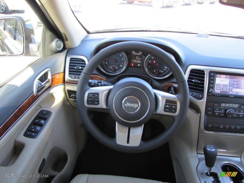 2011 Jeep Grand Cherokee Limited Black/Light Frost Beige Steering Wheel Photo #38601585