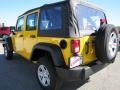 2011 Detonator Yellow Jeep Wrangler Unlimited Sport 4x4  photo #5