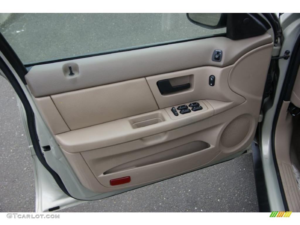 2006 Ford Taurus SE Medium/Dark Pebble Beige Door Panel Photo #38621841