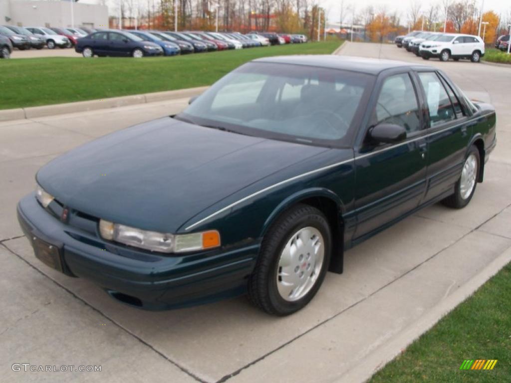 Dark Teal 1996 Oldsmobile Cutlass Supreme SL Sedan Exterior Photo #38628102