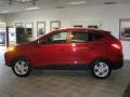 2011 Garnet Red Hyundai Tucson GLS  photo #1