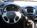 2011 Garnet Red Hyundai Tucson GLS  photo #25