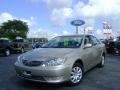 2005 Beige Toyota Camry LE  photo #1