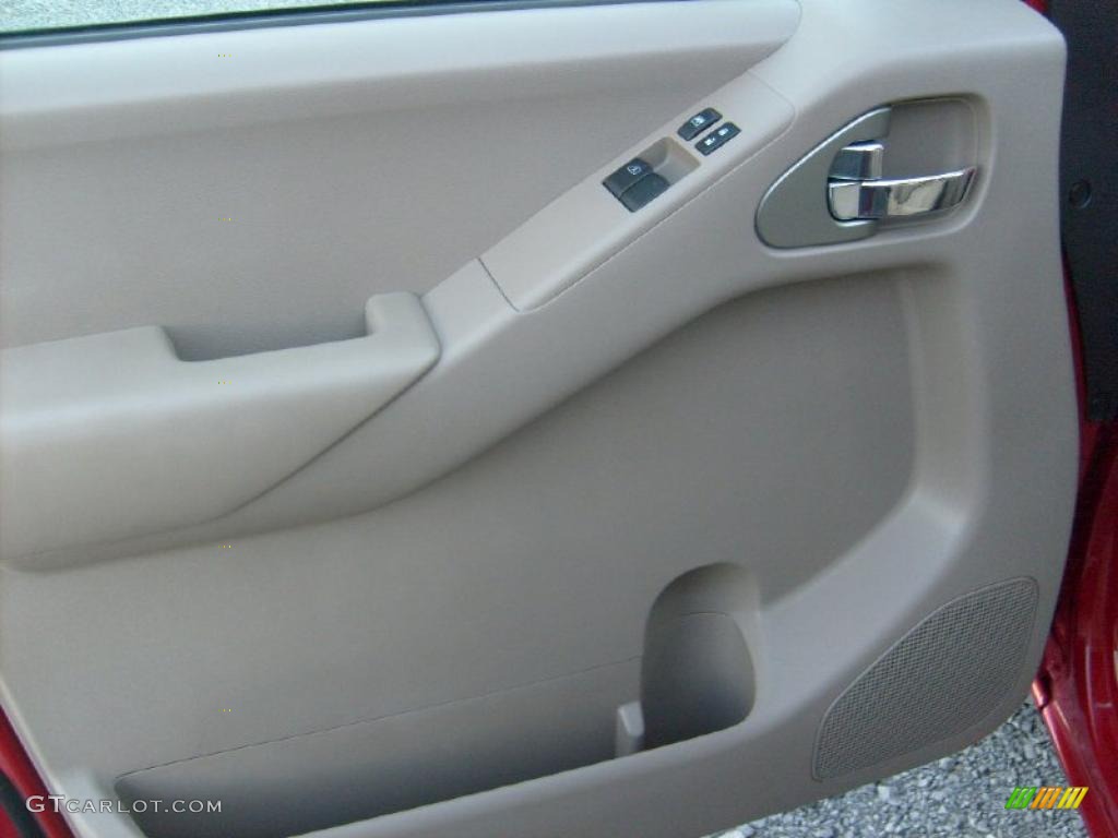 2010 Nissan Frontier SE V6 King Cab 4x4 Beige Door Panel Photo #38647670