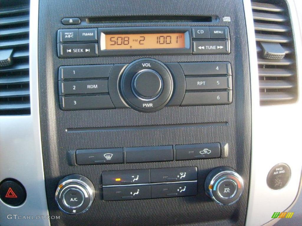 2010 Nissan Frontier SE V6 King Cab 4x4 Controls Photo #38647734
