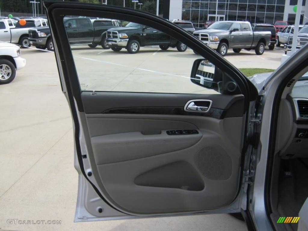 2011 Jeep Grand Cherokee Laredo X Package Dark Graystone/Medium Graystone Door Panel Photo #38651534