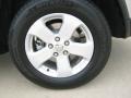 2011 Jeep Grand Cherokee Laredo X Package Wheel and Tire Photo