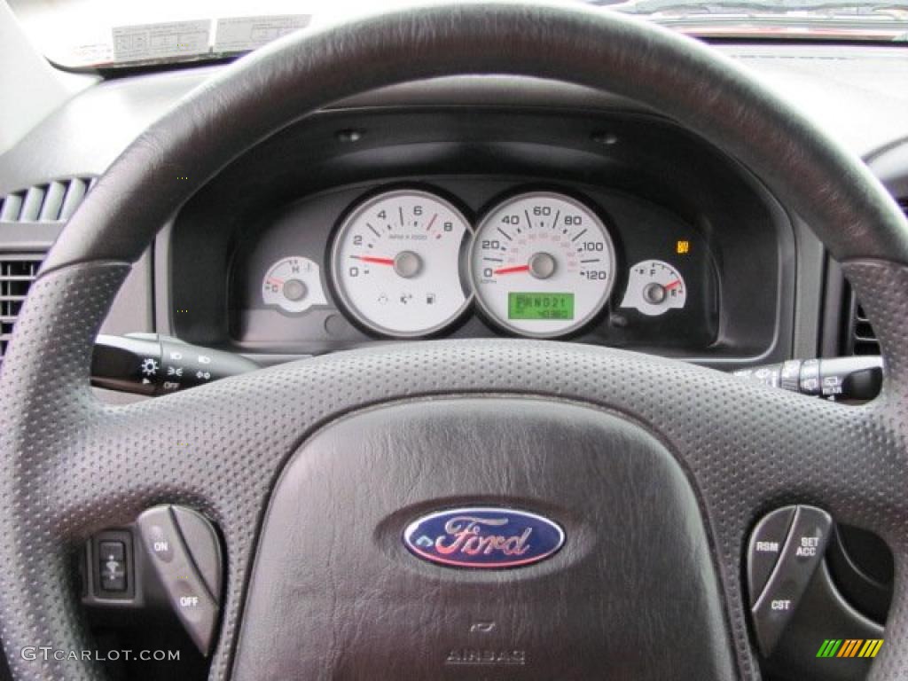 2007 Ford Escape XLS 4WD Medium/Dark Flint Steering Wheel Photo #38660658