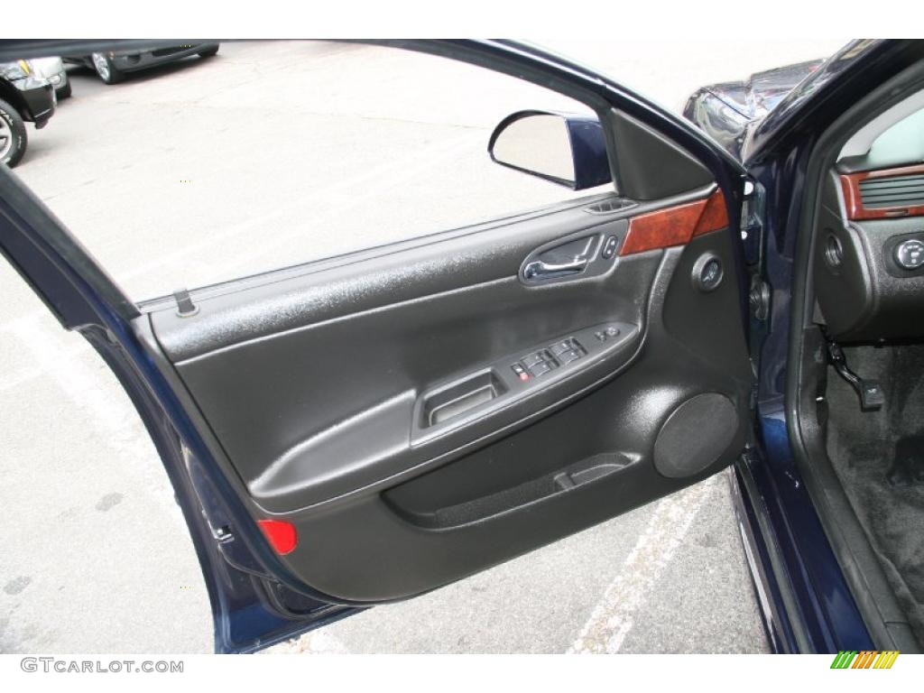 2010 Chevrolet Impala LT Ebony Door Panel Photo #38672419