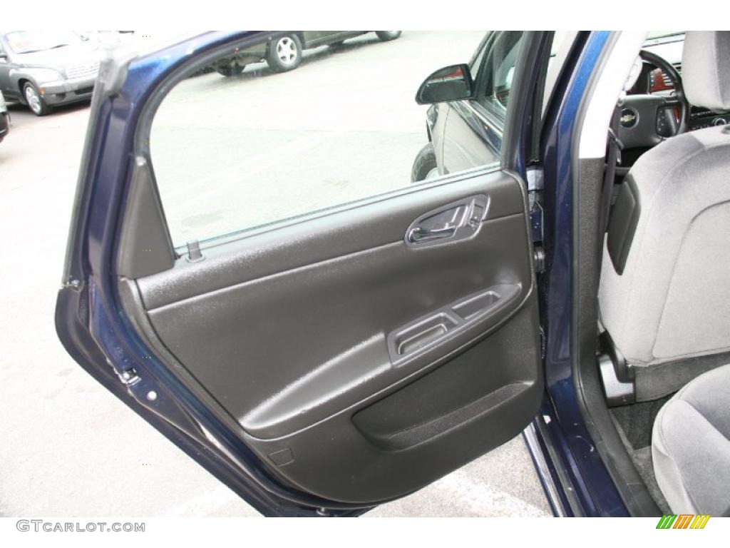 2010 Chevrolet Impala LT Ebony Door Panel Photo #38672431