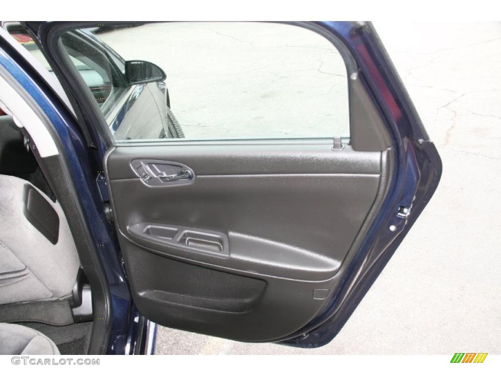 2010 Chevrolet Impala LT Ebony Door Panel Photo #38672443