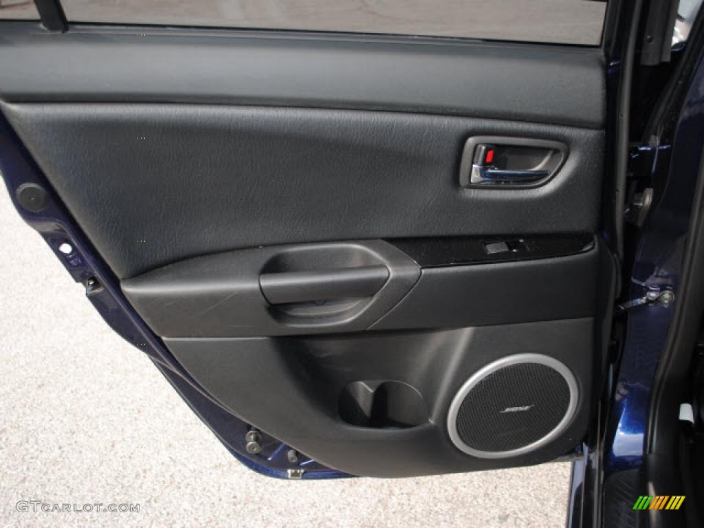 2009 Mazda MAZDA3 s Grand Touring Sedan Black Door Panel Photo #38677694