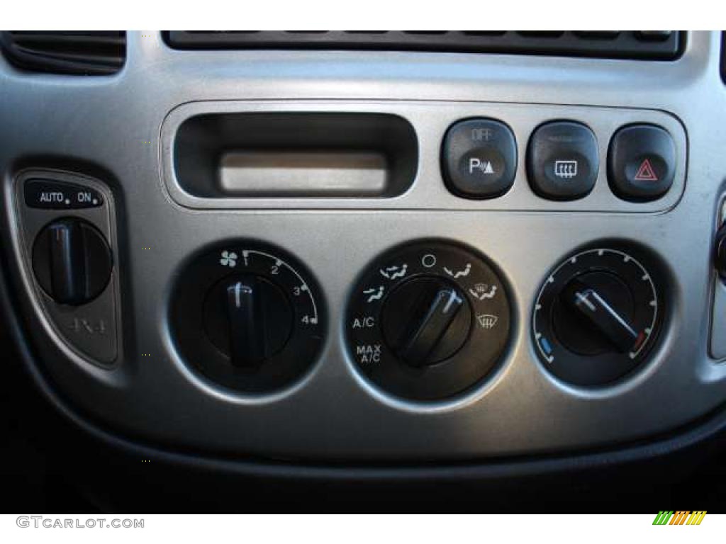 2004 Ford Escape Limited 4WD Controls Photo #38694262