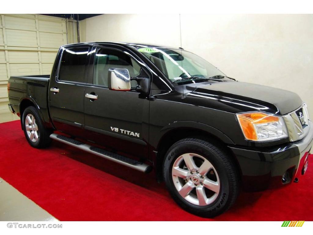 2010 Titan LE Crew Cab - Galaxy Black / Charcoal photo #1