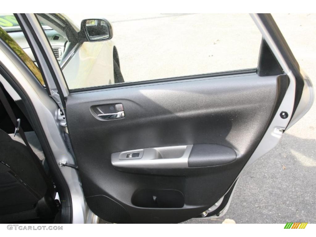 2010 Subaru Impreza 2.5i Premium Sedan Carbon Black Door Panel Photo #38701195