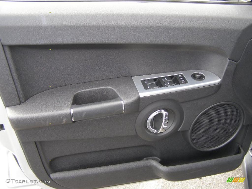 2010 Jeep Commander Sport 4x4 Dark Slate Gray Door Panel Photo #38724551