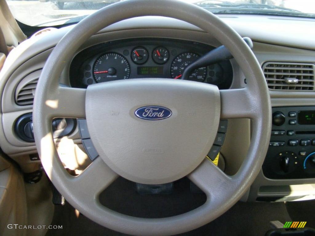 2005 Taurus SE - Gold Ash Metallic / Medium/Dark Pebble photo #16