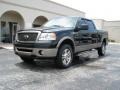 2006 Black Ford F150 Lariat SuperCrew 4x4  photo #2