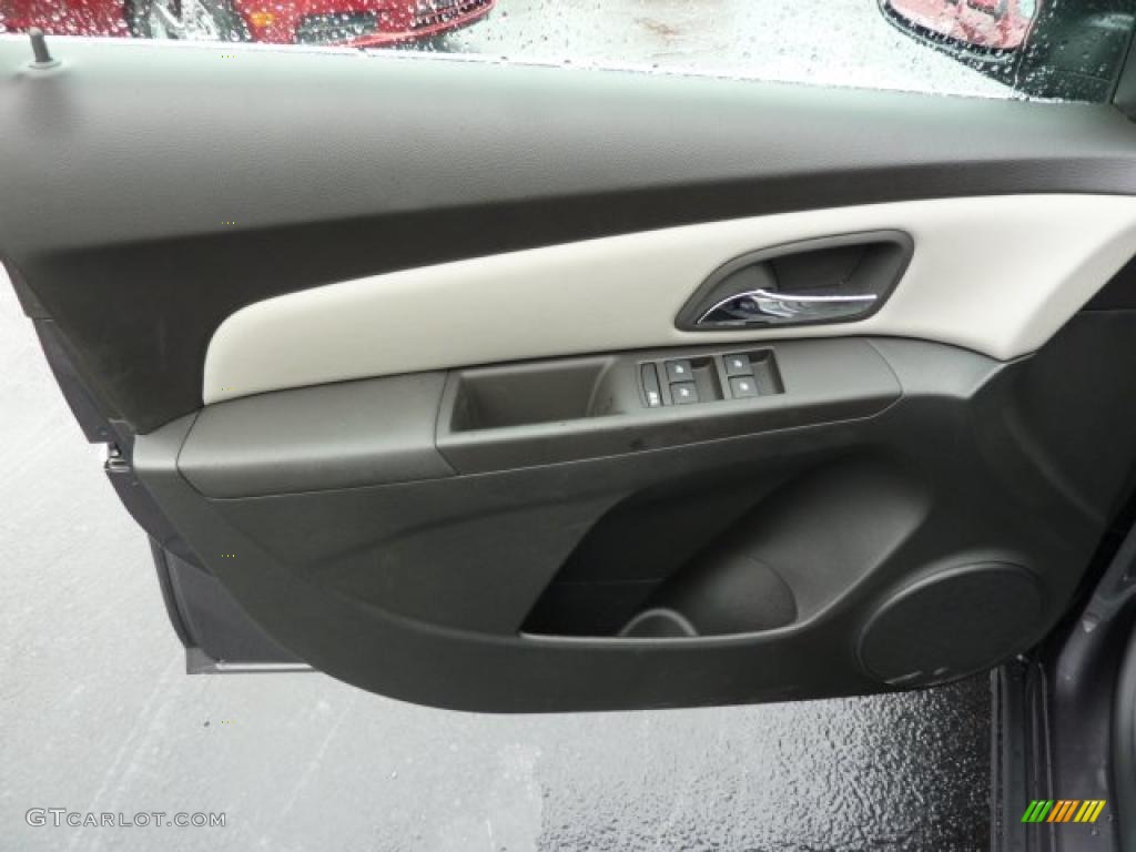 2011 Chevrolet Cruze LS Jet Black/Medium Titanium Door Panel Photo #38728287