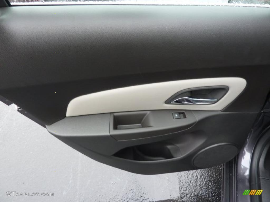 2011 Chevrolet Cruze LS Jet Black/Medium Titanium Door Panel Photo #38728315