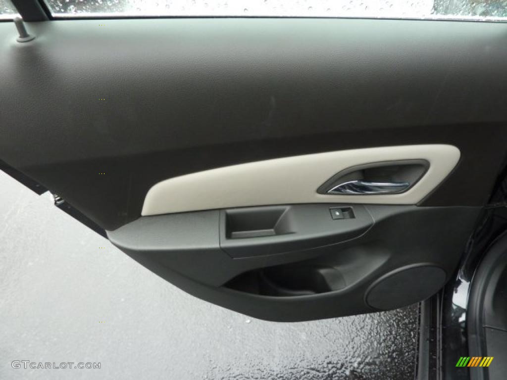 2011 Chevrolet Cruze LS Jet Black/Medium Titanium Door Panel Photo #38732555