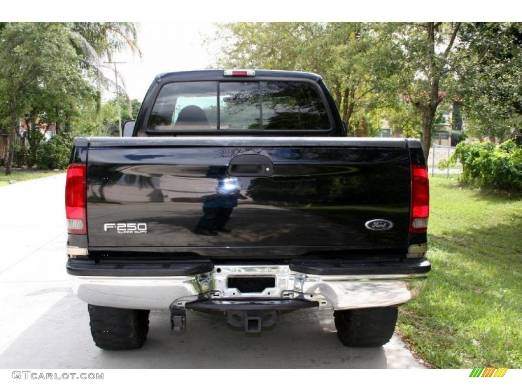 2000 F250 Super Duty Lariat Extended Cab 4x4 - Black / Medium Parchment photo #9