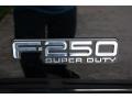 2000 Ford F250 Super Duty Lariat Extended Cab 4x4 Badge and Logo Photo