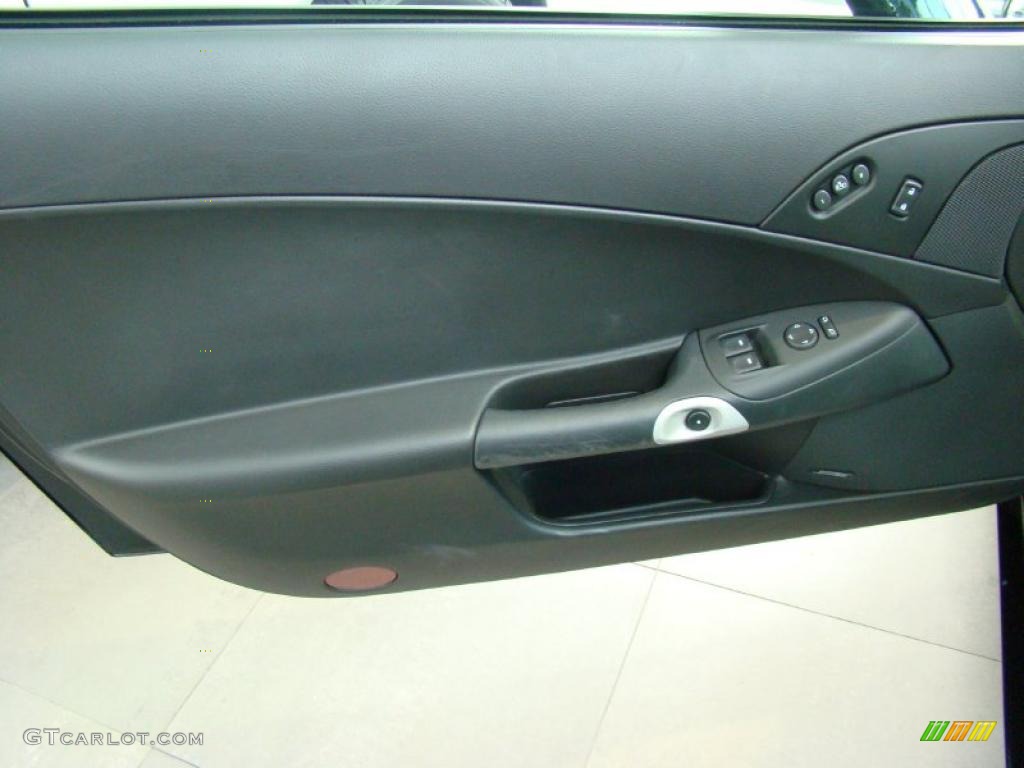 2009 Chevrolet Corvette Coupe Ebony Door Panel Photo #38749844