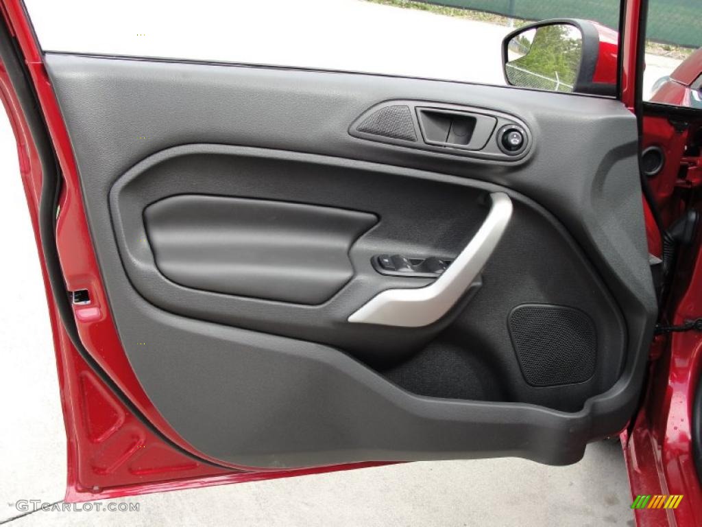 2011 Ford Fiesta SES Hatchback Charcoal Black Leather Door Panel Photo #38751116