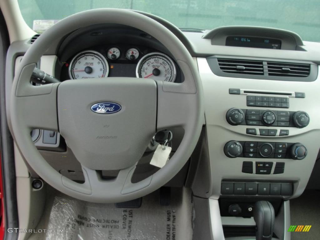 2011 Ford Focus S Sedan Medium Stone Dashboard Photo #38753384