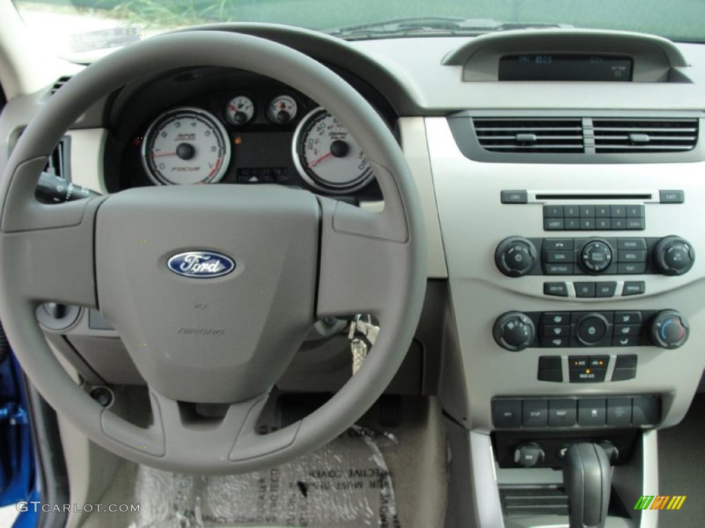 2011 Ford Focus S Sedan Medium Stone Dashboard Photo #38754608